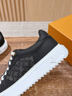 Schwarze Leder-Monogramm-Low-Top-Sneaker – Damen