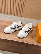 Schwarze Low-Top-Sneaker aus Leder mit Monogramm – Damen