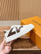 Schwarze Low-Top-Sneaker aus Leder mit Monogramm – Damen