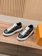 Schwarze Low-Top-Sneaker aus Leder mit Monogramm – Damen