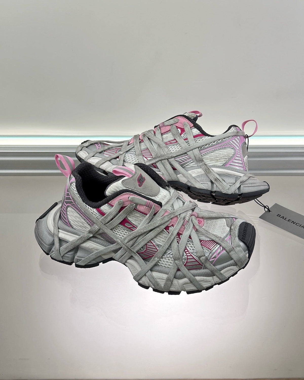 White and Pink Distressed Sneakers