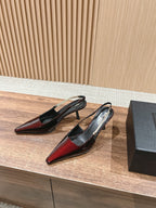 Schwarze und rote High Heels