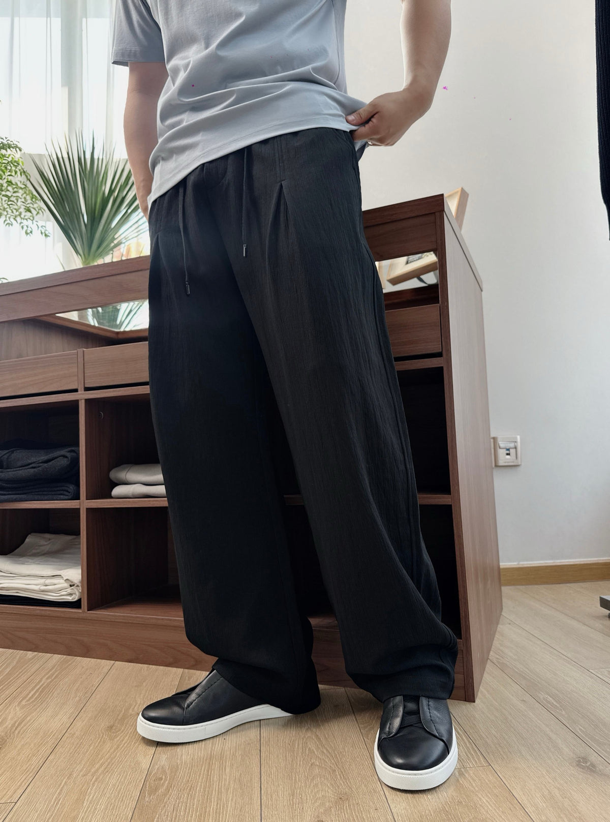 Schwarze, elastische weite Beinhose aus Baumwolle – Herren
