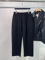 Schwarze, elastische weite Beinhose aus Baumwolle – Herren