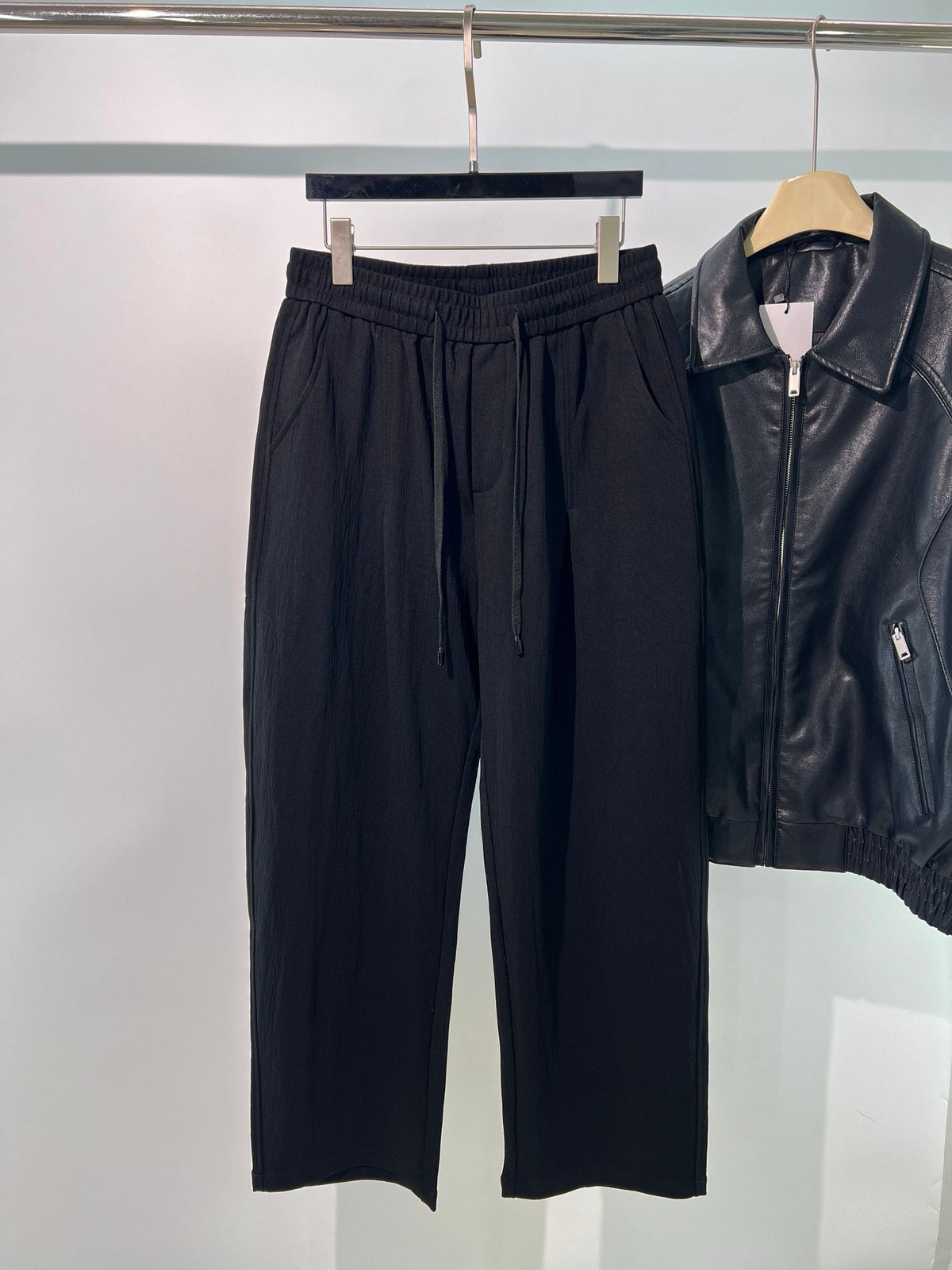 Schwarze, elastische weite Beinhose aus Baumwolle – Herren