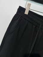 Schwarze, elastische weite Beinhose aus Baumwolle – Herren