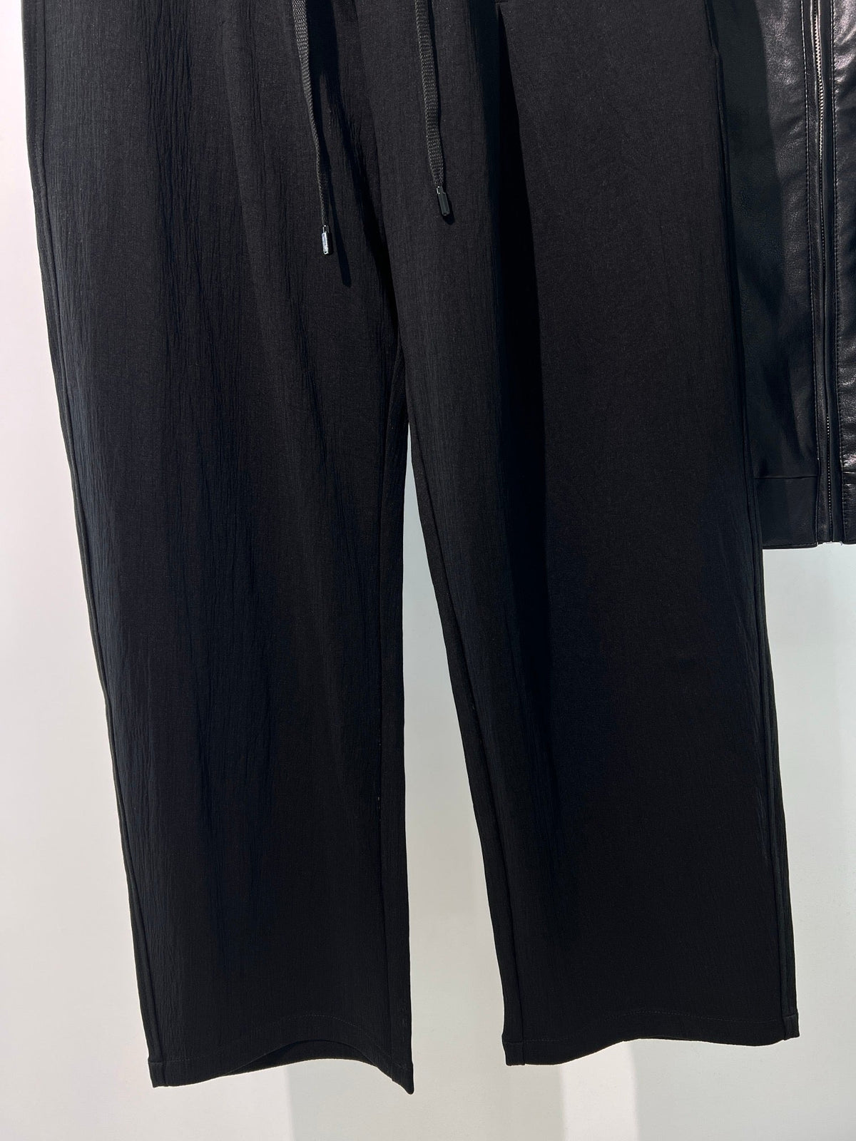 Schwarze, elastische weite Beinhose aus Baumwolle – Herren
