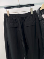 Schwarze, elastische weite Beinhose aus Baumwolle – Herren