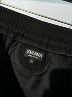 Schwarze, elastische weite Beinhose aus Baumwolle – Herren