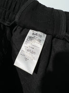 Schwarze, elastische weite Beinhose aus Baumwolle – Herren