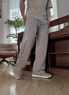 Schwarze, elastische weite Beinhose aus Baumwolle – Herren