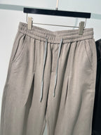 Schwarze, elastische weite Beinhose aus Baumwolle – Herren