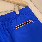 Orangefarbene Badeshorts aus schlichtem Nylon – Herren