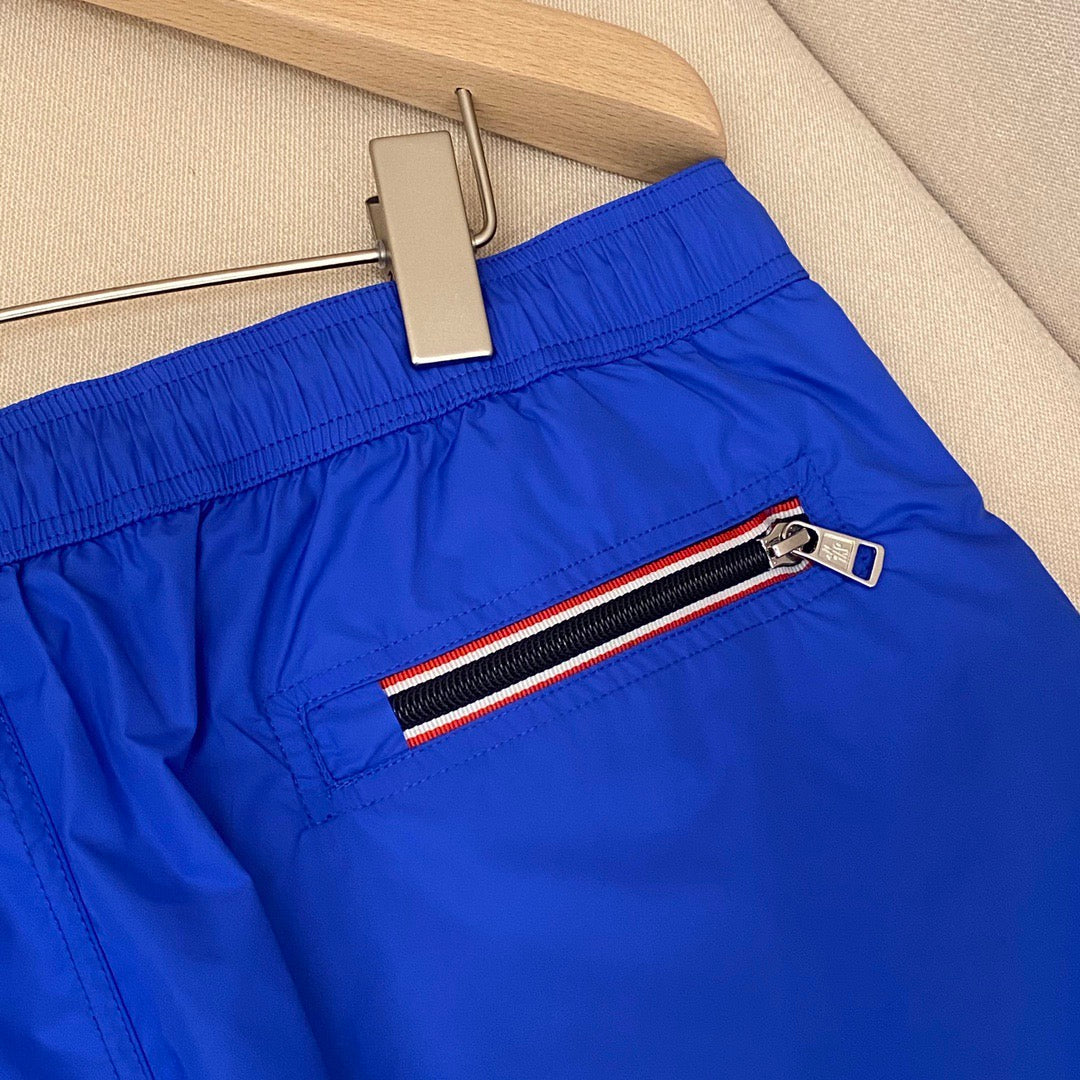 Orangefarbene Badeshorts aus schlichtem Nylon – Herren