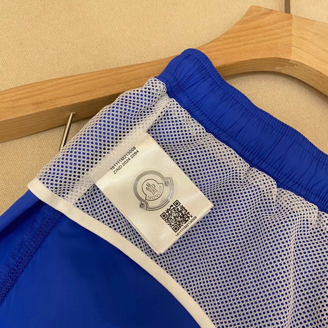Orangefarbene Badeshorts aus schlichtem Nylon – Herren