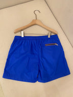 Orangefarbene Badeshorts aus schlichtem Nylon – Herren