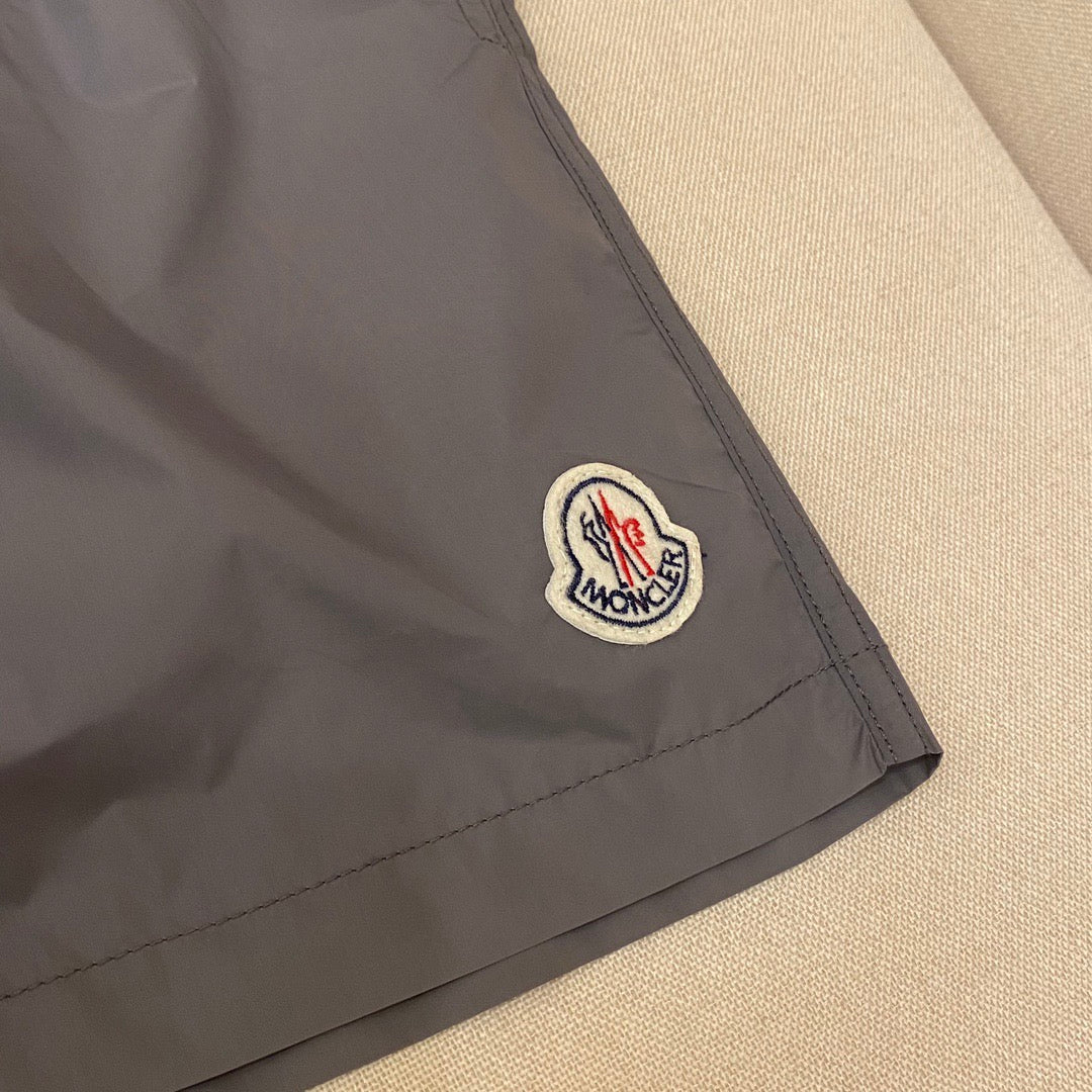 Orangefarbene Badeshorts aus schlichtem Nylon – Herren