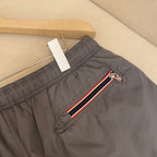 Orangefarbene Badeshorts aus schlichtem Nylon – Herren