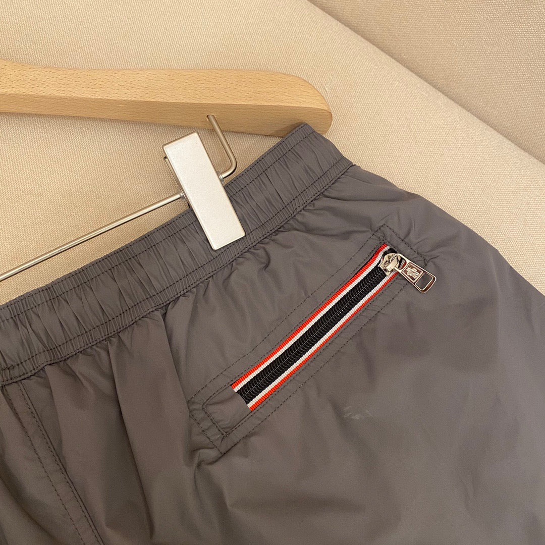 Orangefarbene Badeshorts aus schlichtem Nylon – Herren