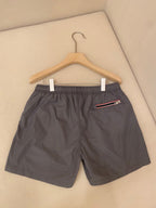 Orangefarbene Badeshorts aus schlichtem Nylon – Herren