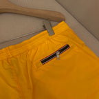 Orangefarbene Badeshorts aus schlichtem Nylon – Herren