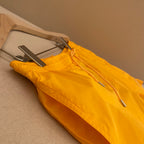 Orangefarbene Badeshorts aus schlichtem Nylon – Herren