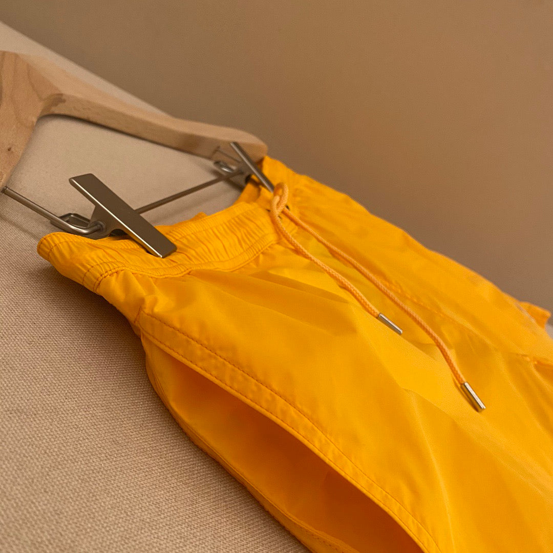 Orangefarbene Badeshorts aus schlichtem Nylon – Herren