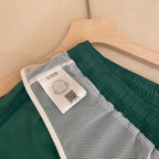 Orangefarbene Badeshorts aus schlichtem Nylon – Herren