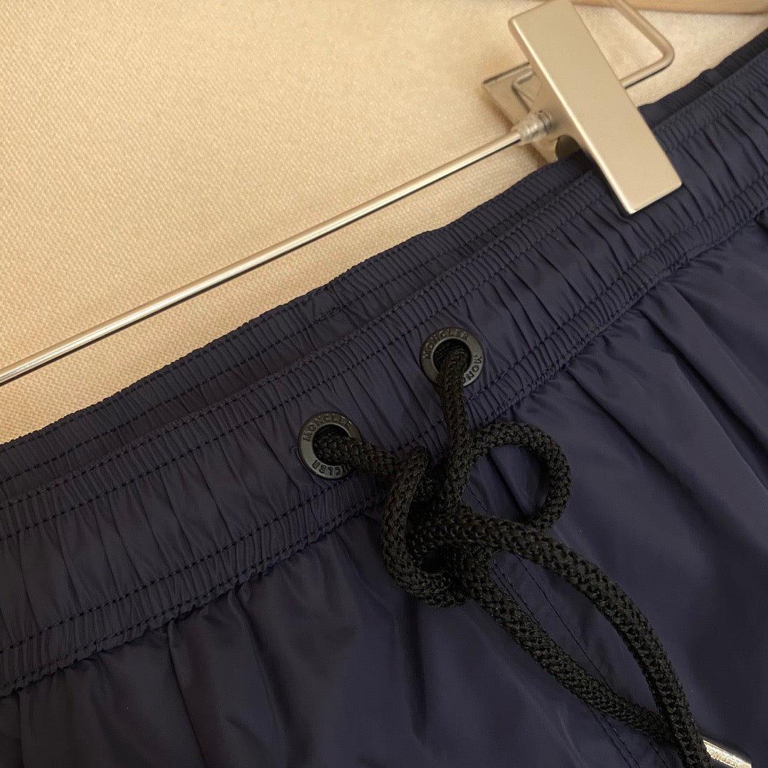 Orangefarbene Badeshorts aus schlichtem Nylon – Herren