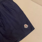 Orangefarbene Badeshorts aus schlichtem Nylon – Herren