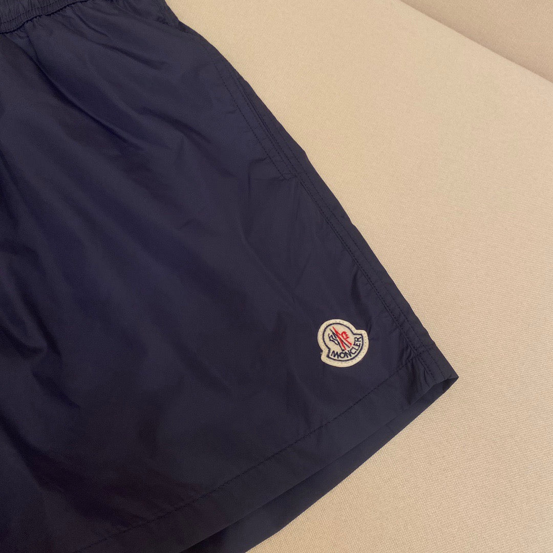 Orangefarbene Badeshorts aus schlichtem Nylon – Herren