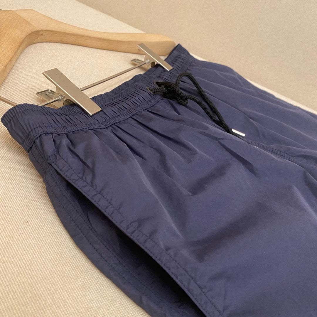 Orangefarbene Badeshorts aus schlichtem Nylon – Herren