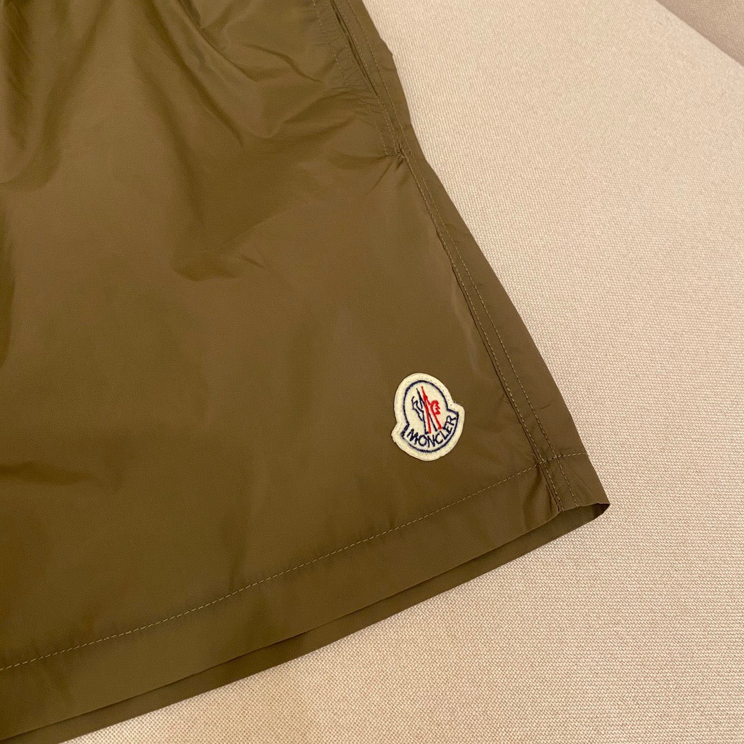 Orangefarbene Badeshorts aus schlichtem Nylon – Herren