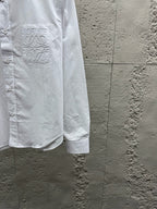 Blaues Baumwoll-Langarmshirt mit Tasche – Herren
