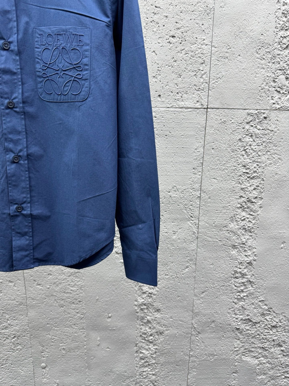 Blaues Baumwoll-Langarmshirt mit Tasche – Herren