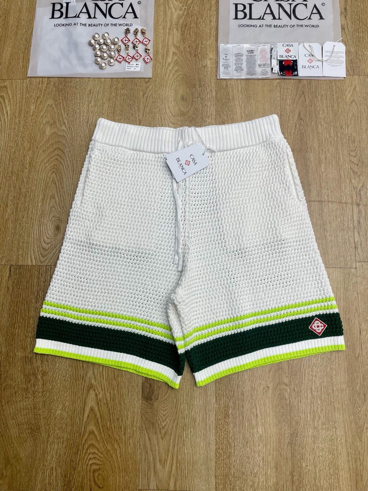 Gelb gestreifte Strickshorts – Herren