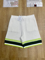 Gelb gestreifte Strickshorts – Herren