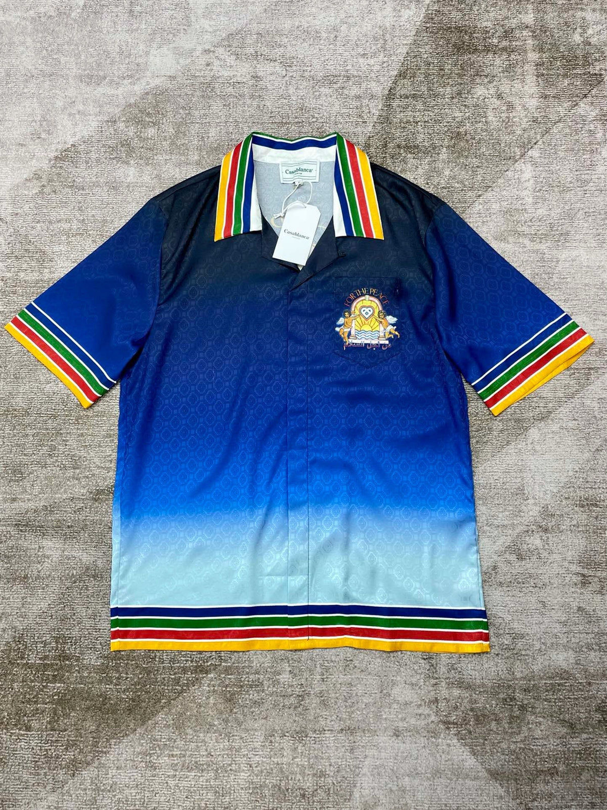 Blaues Strickpoloshirt mit Farbverlauf – Herren
