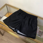 Schwarze Nylon-Sporthose mit Seitenstreifen – Herren