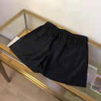 Schwarze Nylon-Sporthose mit Seitenstreifen – Herren
