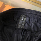 Schwarze Nylon-Sporthose mit Seitenstreifen – Herren