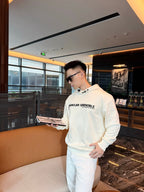 Cremefarbener Pullover mit Text-Logo aus Baumwolle – Herren