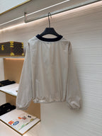 Cremefarbenes Langarmshirt aus Baumwolle mit Kontrastkragen – Damen