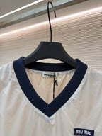 Cremefarbenes Langarmshirt aus Baumwolle mit Kontrastkragen – Damen