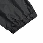 Schwarze Nylon-Kapuzenjacke mit farblich abgesetztem Reißverschluss – Herren