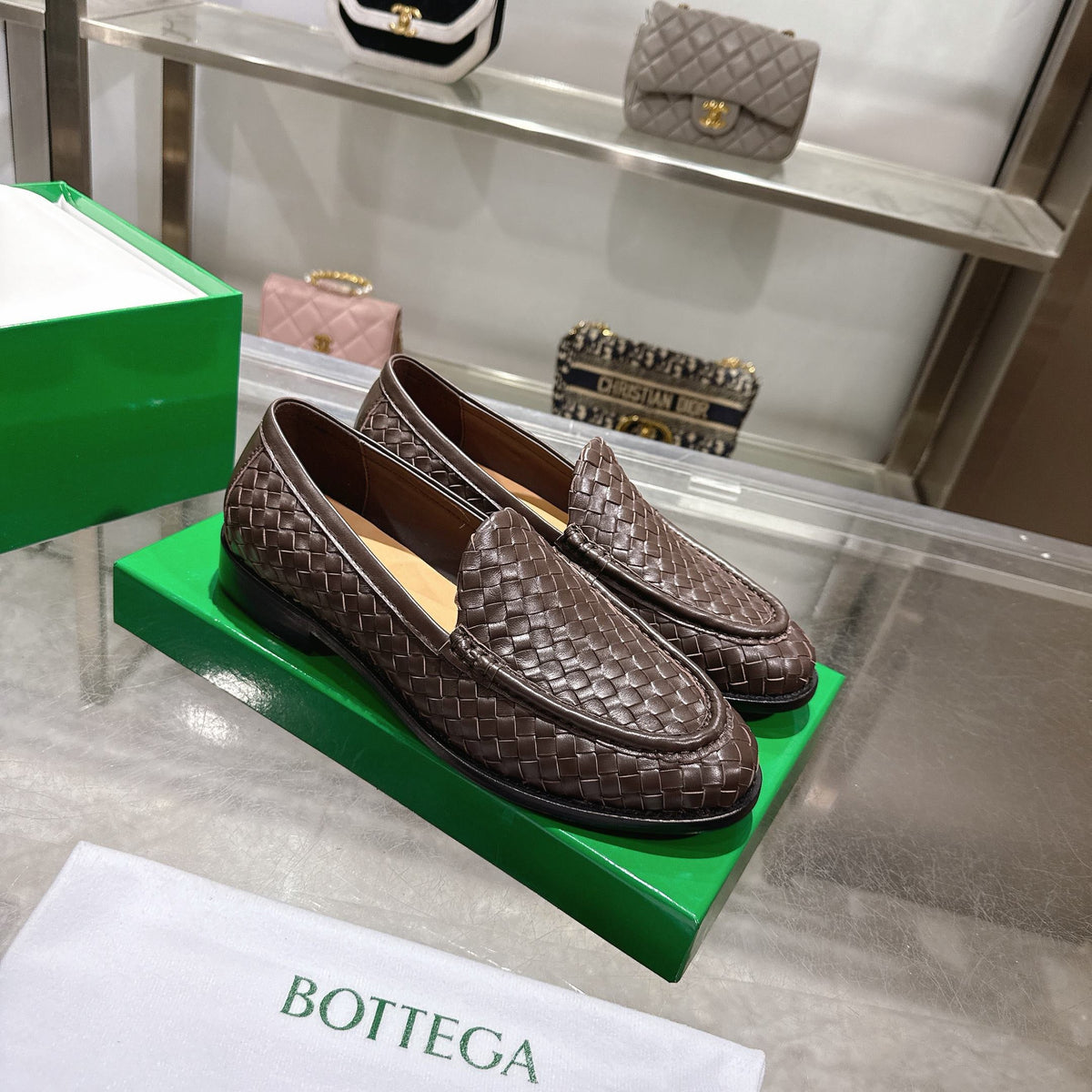 Schwarzer gewebter Intrecciato-Leder-Slipper – Herren