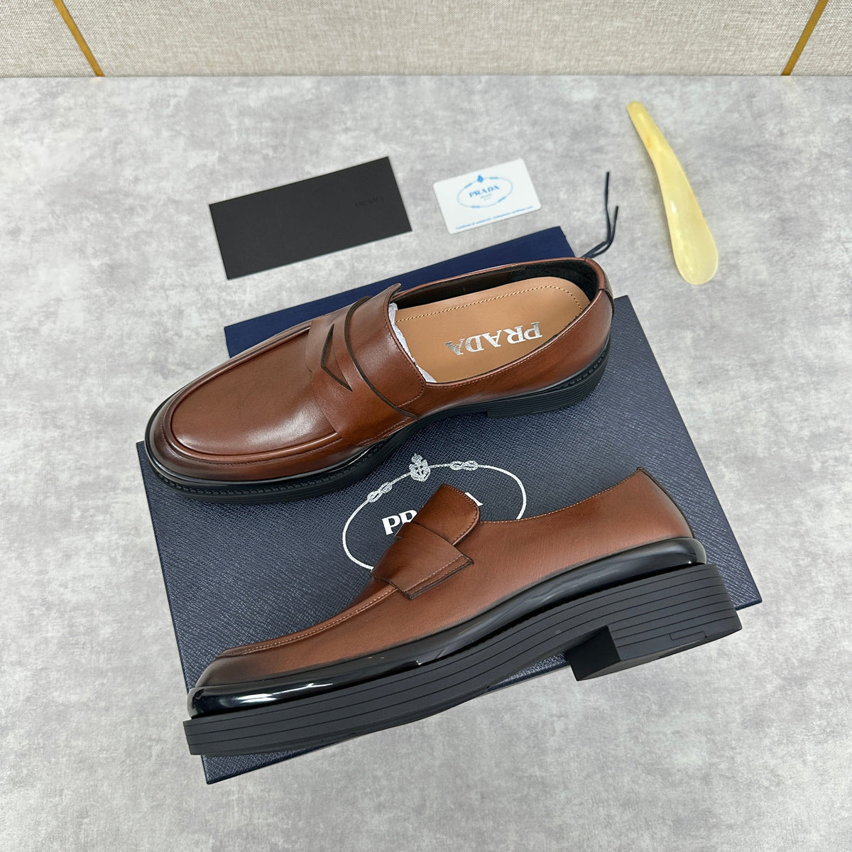 Braune klobige Penny Loafer aus Leder – Herren