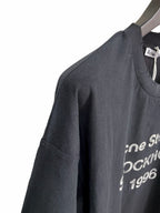 Schwarzes Kurzarm-T-Shirt aus Baumwolle mit Textprint – Herren