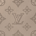 Hand It All MM – beautifully crafted from the Maison’s exclusive perforated calfskin, the Mahina Hand – LUX VERSE Luxury Designer Fashion Outlet