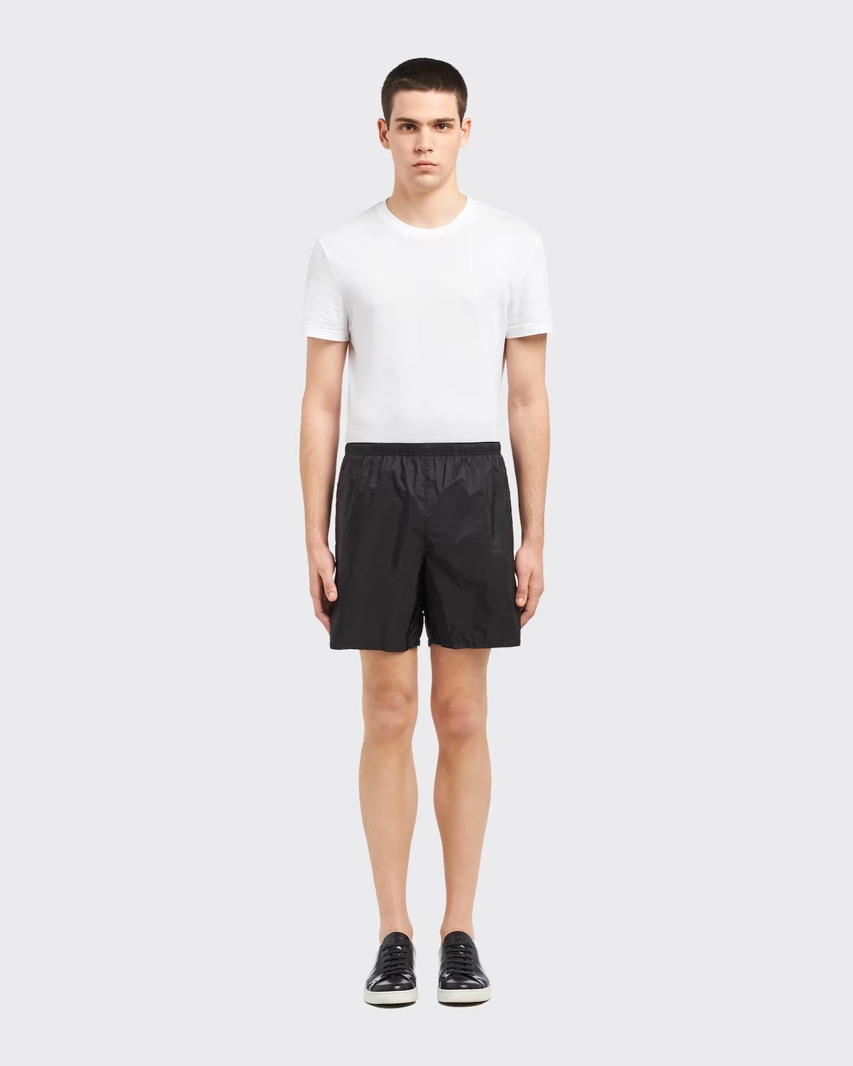 Re-Nylon swim trunks – the style with a classic silhouette, characterized by the elasticized waistband, is – LUX VERSE Luxury Designer Fashion Outlet